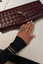 Women vegan leather baguette clutch bag with gold knot hardware and crossbody strap