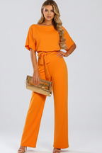 Women's wide leg jumpsuit with tie belt and short sleeves, full length