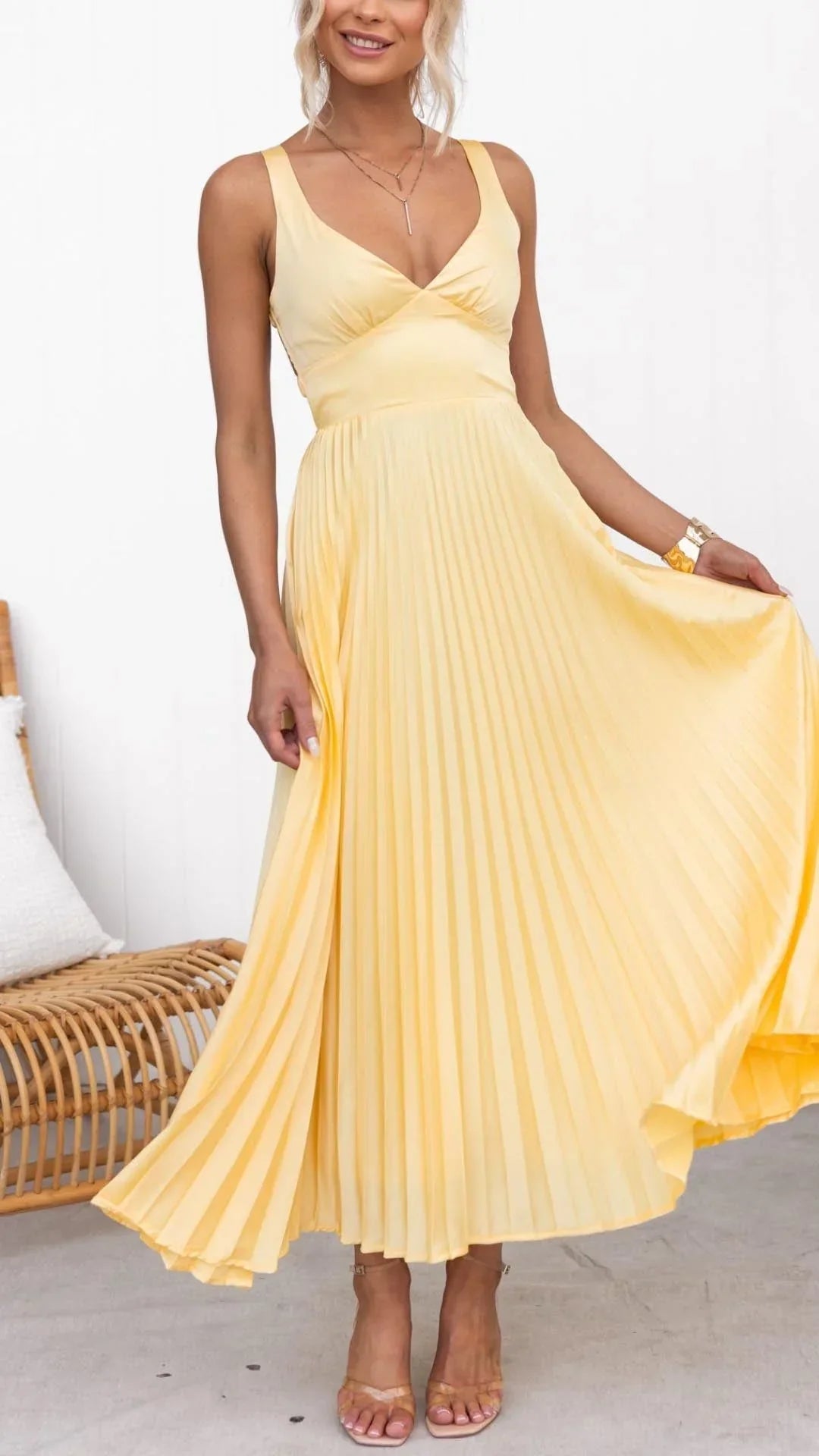 Yellow pleated V-neck maxi dress with adjustable crossover back straps, women's formal dress