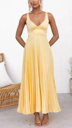 Yellow pleated V-neck maxi dress with adjustable crossover back straps, women's formal dress