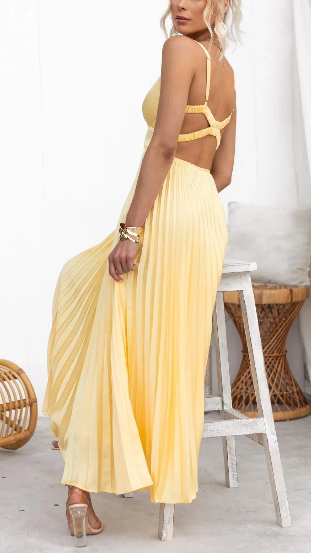 Yellow pleated V-neck maxi dress with adjustable crossover back straps, women's formal dress