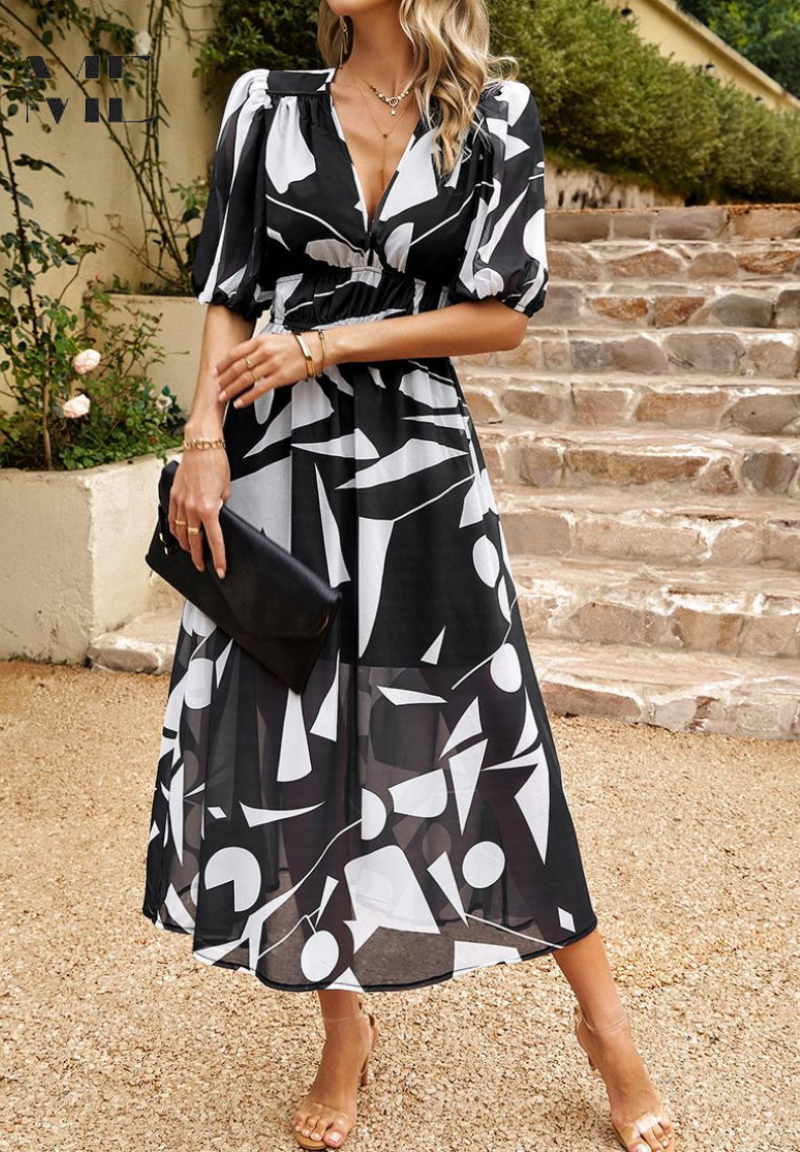 Floral midi dress with puff sleeves and flattering waist-tailored fit