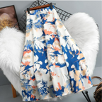 Women's A-line skirt with vibrant floral print, available in multiple colors