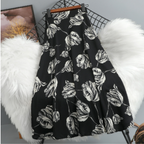 Women's A-line skirt with vibrant floral print, available in multiple colors