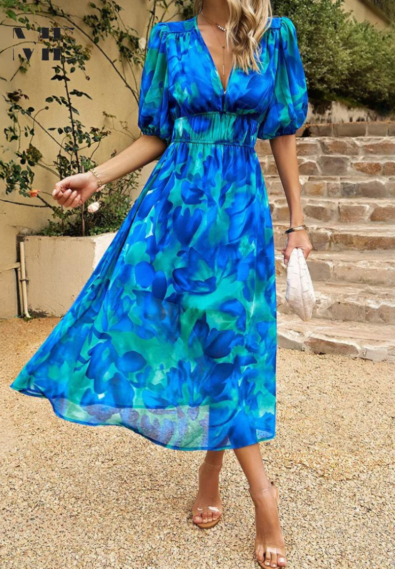 Floral midi dress with puff sleeves and flattering waist-tailored fit