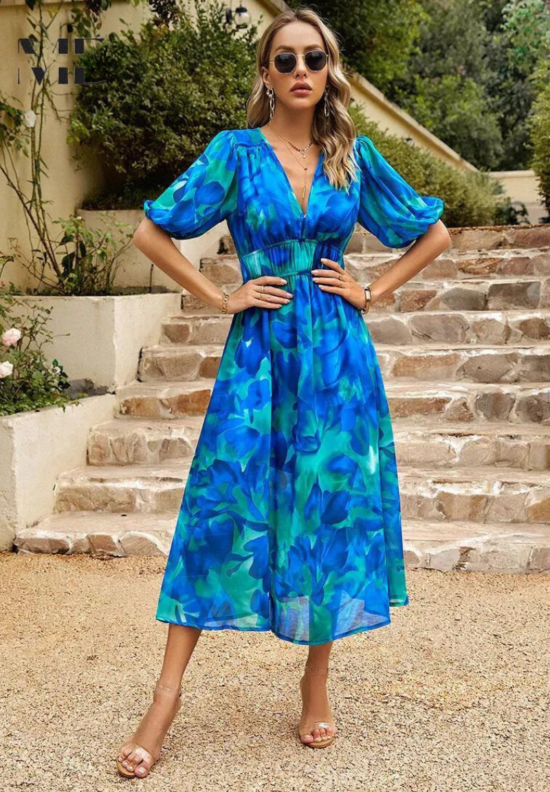 Floral midi dress with puff sleeves and flattering waist-tailored fit