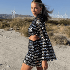 Women sequin mini dress with flared sleeves and waist cut-out detail
