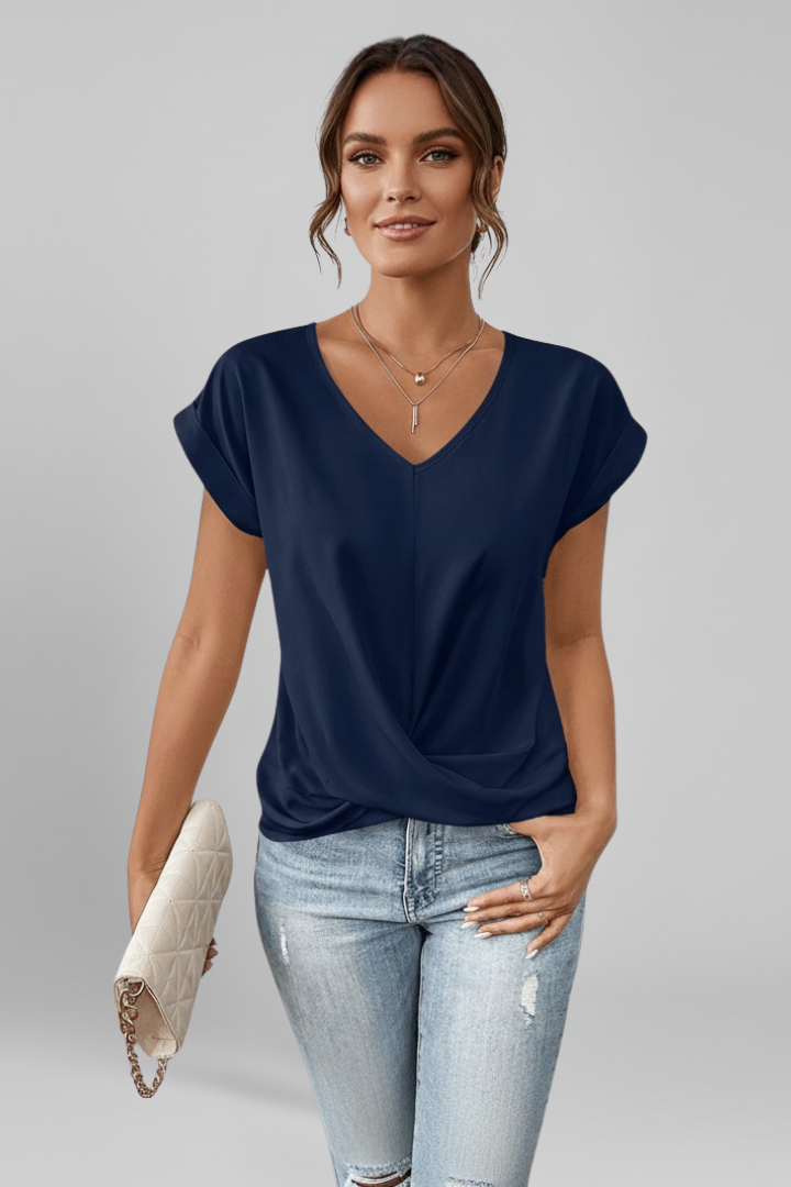 Women's blouse with V-neckline and short sleeves, relaxed fit, available in multiple colours