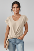 Women's blouse with V-neckline and short sleeves, relaxed fit, available in multiple colours