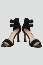 Women's black leather sandals with stiletto heel and ankle strap, open toe