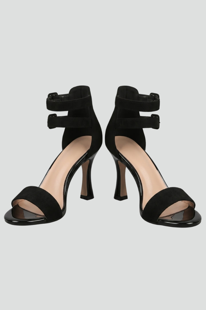 Women's black leather sandals with stiletto heel and ankle strap, open toe