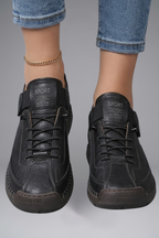 Women's leather trainers with elastic side panels and EVA sole, slip-on sneakers