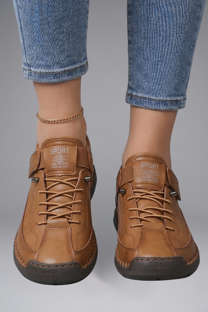 Women's leather trainers with elastic side panels and EVA sole, slip-on sneakers