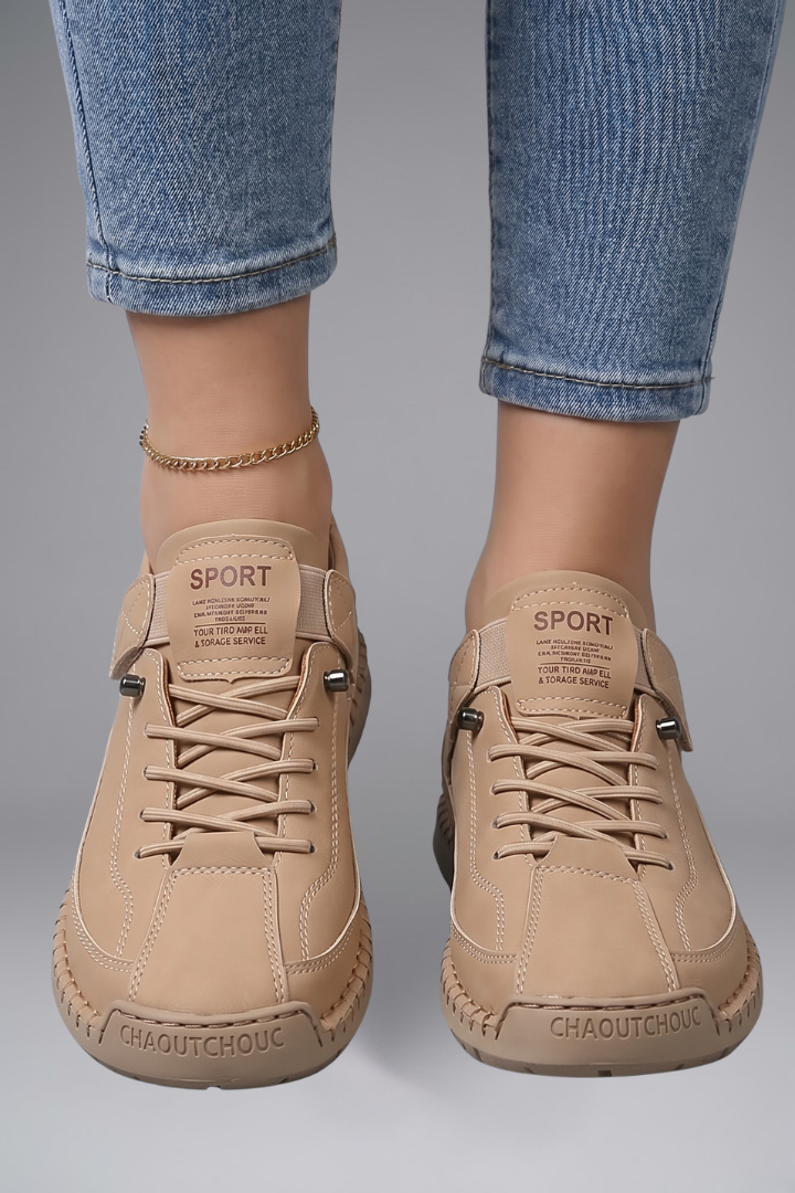 Women's leather trainers with elastic side panels and EVA sole, slip-on sneakers