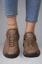 Women's leather trainers with elastic side panels and EVA sole, slip-on sneakers