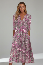 Women's midi dress with V-neck, three-quarter sleeves and all-over printed pattern