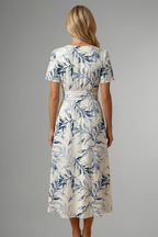 Women's midi dress with floral print, V neckline and A-line short sleeve design