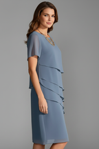 Women's short sleeve dress with layered front panel and straight knee-length hem