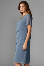 Women's short sleeve dress with layered front panel and straight knee-length hem