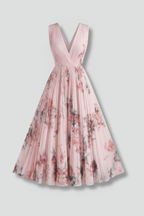 Women's sleeveless V-neck dress with pleated midi skirt and all-over printed pattern