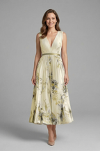 Women's sleeveless V-neck dress with pleated midi skirt and all-over printed pattern