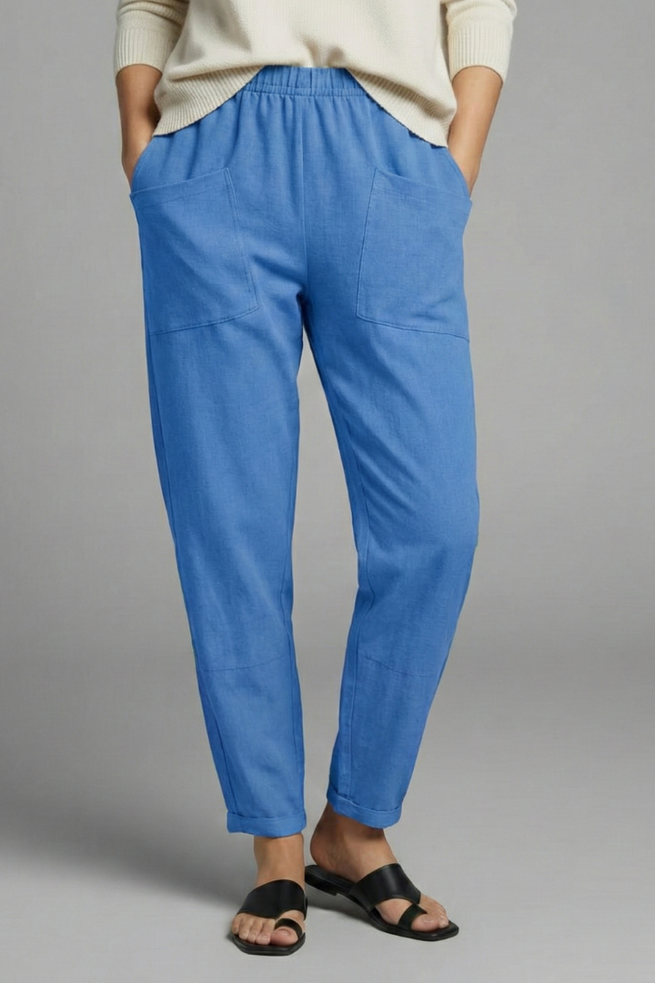 Women's trousers with elastic waist, side pockets and tapered ankle length