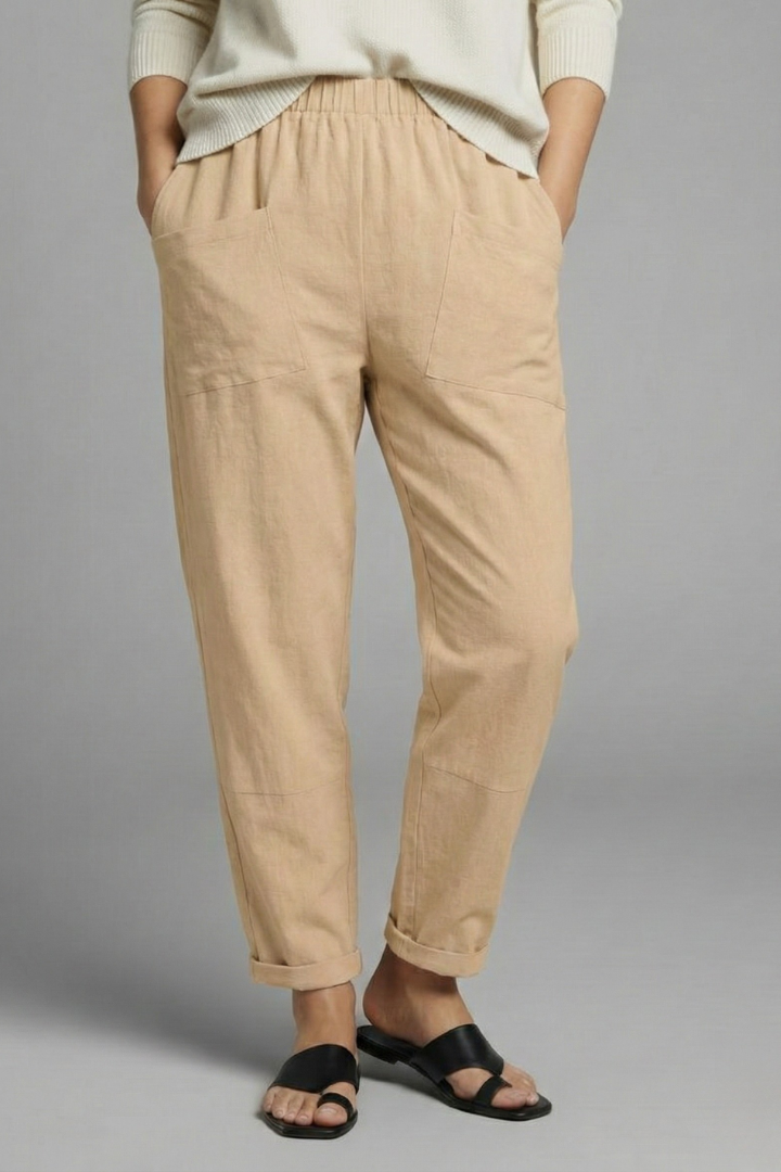 Women's trousers with elastic waist, side pockets and tapered ankle length