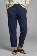 Women's trousers with elastic waist, side pockets and tapered ankle length