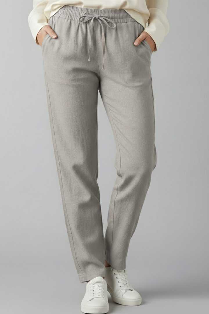 Women's trousers with elastic waist, side pockets and tapered ankle length