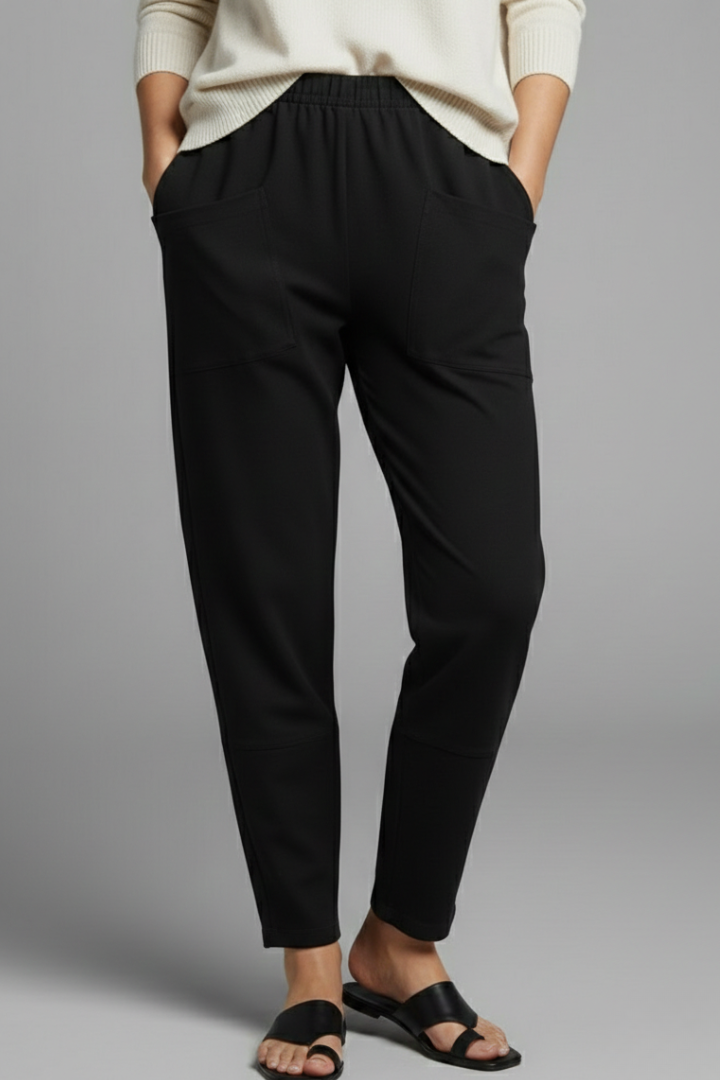 Women's trousers with elastic waist, side pockets and tapered ankle length