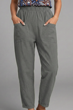 Women's trousers with elastic waist, side pockets and tapered ankle length