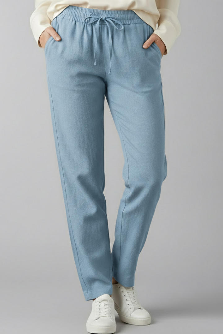Women's trousers with elastic waist, side pockets and tapered ankle length