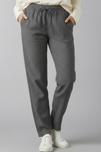 Women's trousers with elastic waist, side pockets and tapered ankle length