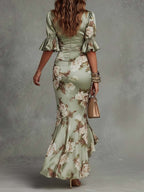Women's floral satin midi dress with deep V-neckline and ruched waist