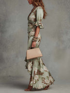 Women's floral satin midi dress with deep V-neckline and ruched waist