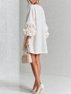Women's linen mini shift dress with puff long sleeves and button-front closure, relaxed fit
