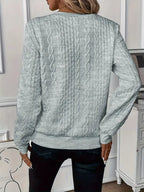 Women's soft knit sweater in versatile everyday style, feminine cut