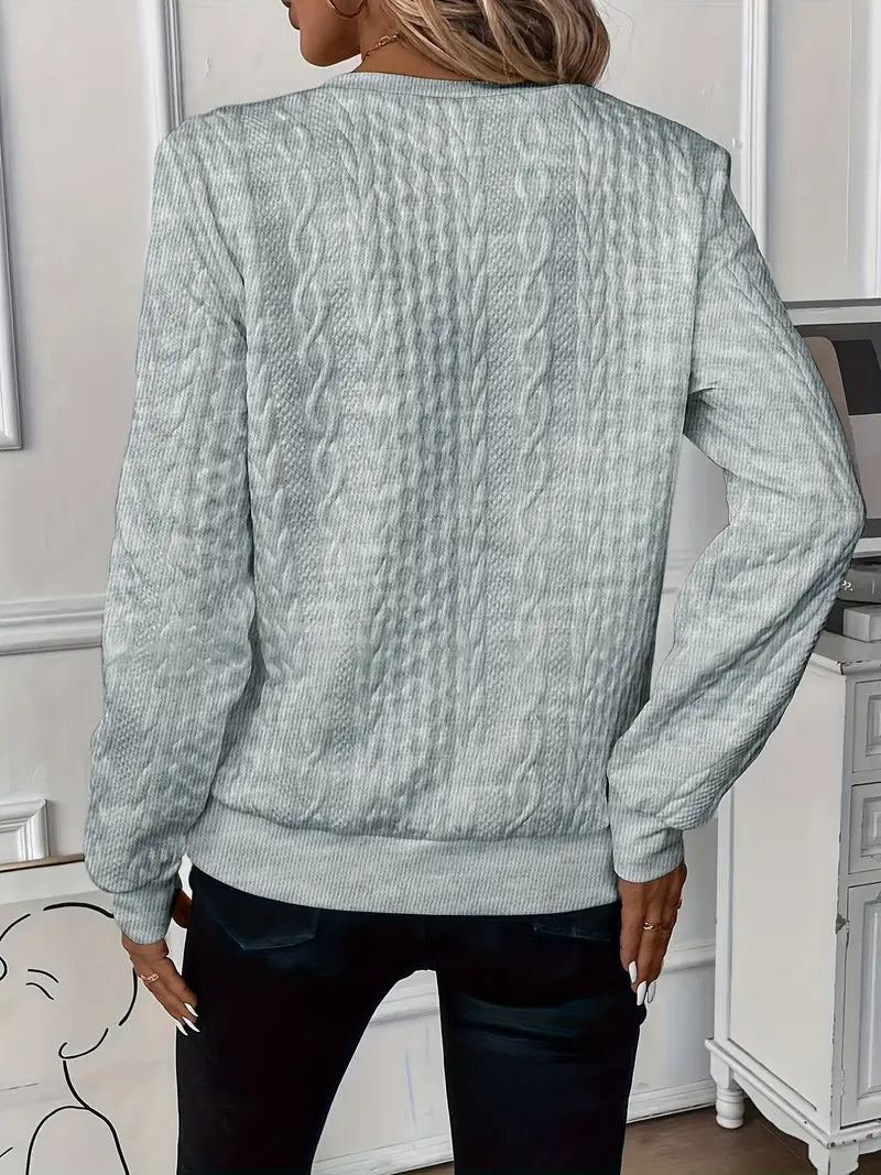 Women's soft knit sweater in versatile everyday style, feminine cut