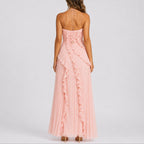 Women halter neck ruffle maxi dress with high low hem in flowing fabric