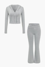 Women 2 piece knit hoodie and flared pants set with side buckle detail