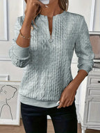 Women's soft knit sweater in versatile everyday style, feminine cut