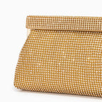 Gold evening clutch bag with crystal embellishments and snap closure