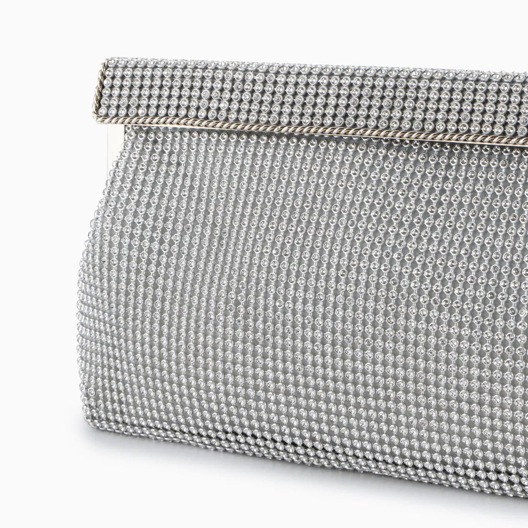 Gold evening clutch bag with crystal embellishments and snap closure