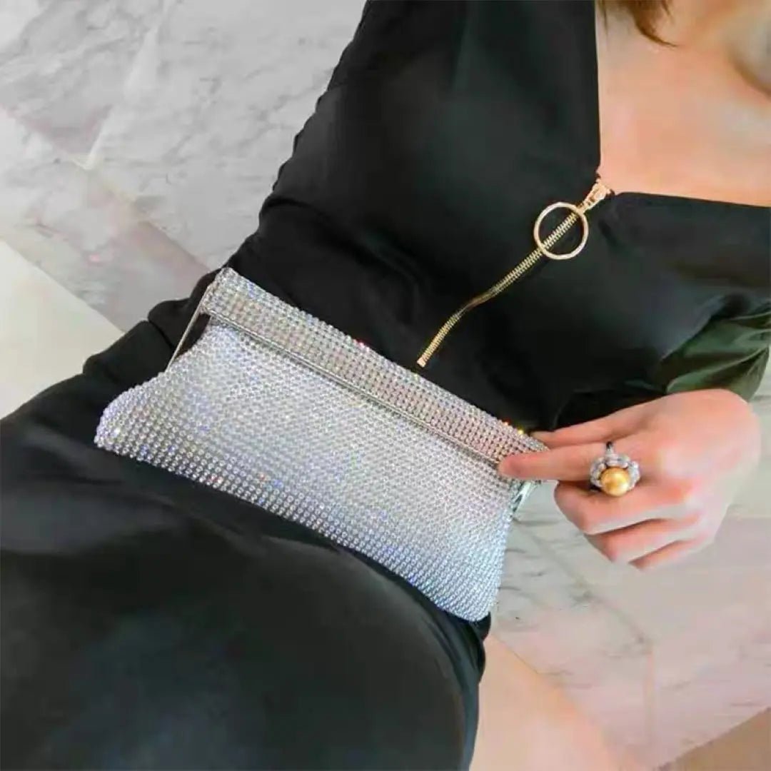 Gold evening clutch bag with crystal embellishments and snap closure