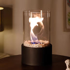 Decorative ethanol oil lamp with metal frame, glass cylinder, and decorative stones, indoor and outdoor