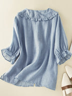 Women's lightweight ruffle collar blouse with button-front closure, elegant and feminine