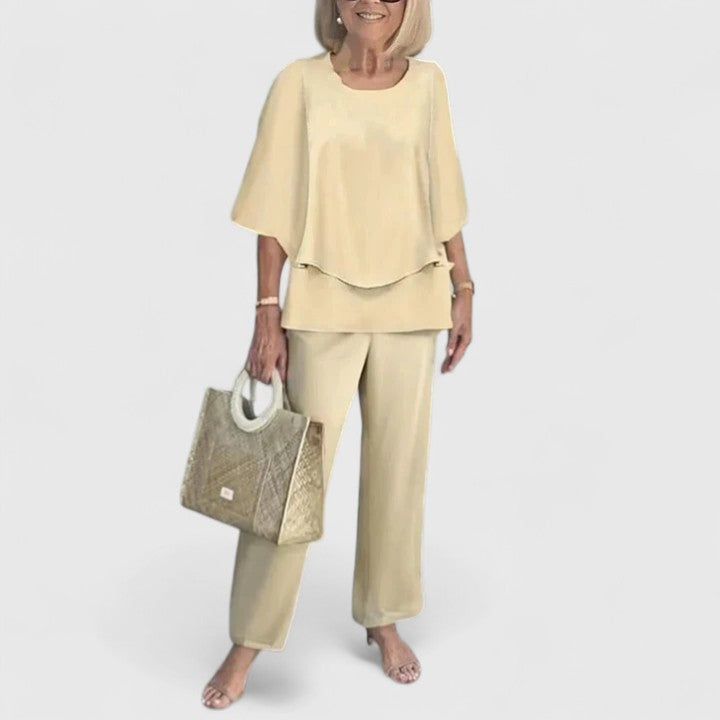 Women's two-piece pant set with relaxed fit top and wide leg pants, casual coordinated outfit