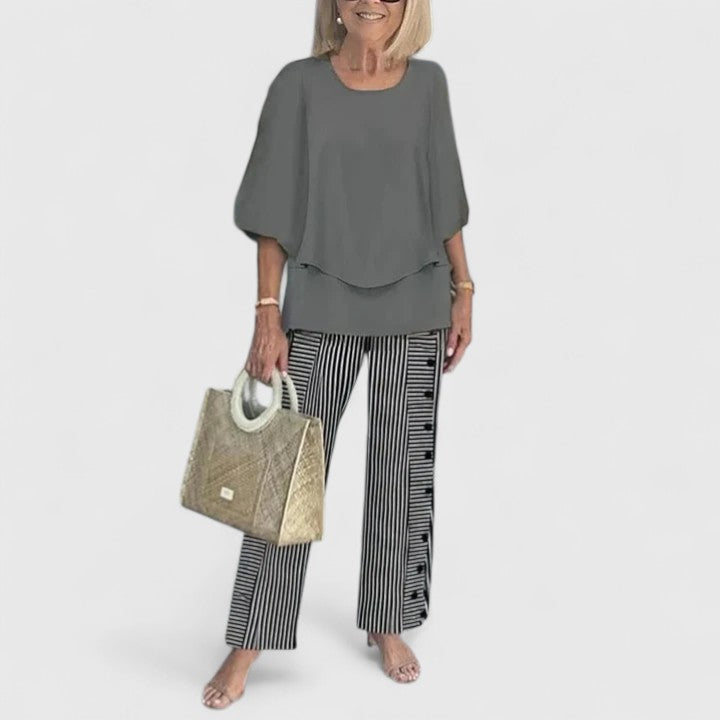 Women's two-piece pant set with relaxed fit top and wide leg pants, casual coordinated outfit