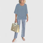 Women's two-piece pant set with relaxed fit top and wide leg pants, casual coordinated outfit