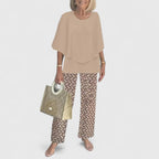 Women's two-piece pant set with relaxed fit top and wide leg pants, casual coordinated outfit